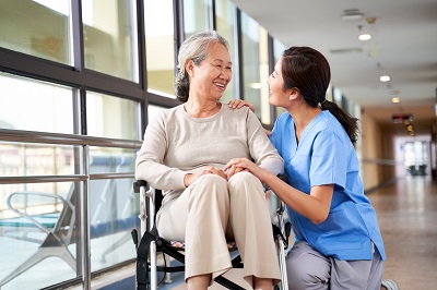 Two Women Smiling in a Long Term Care Facility